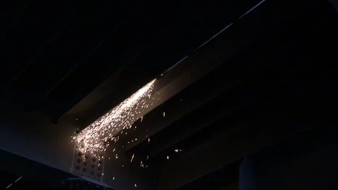 Sparks flying from above from work. Construction 2 Stock-Footage 101889353