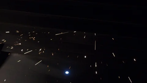 Sparks flying from above from work. Construction 3 Stock Footage 101890611