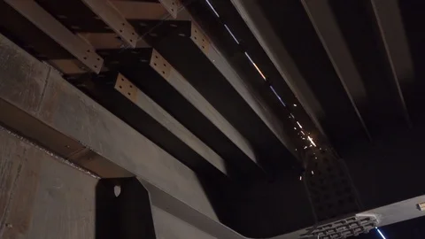 Sparks flying from above from work. Construction 스톡 동영상 101893287