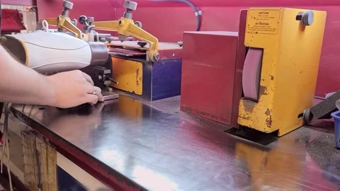 Sparks flying after sharpening a figure skate. Moving camera Stock Footage 247995801