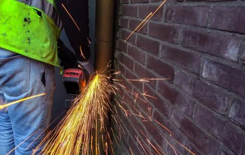Sparks flying from an angle grinder Stock Photos