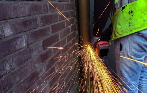 Sparks flying from an angle grinder Stock Photos