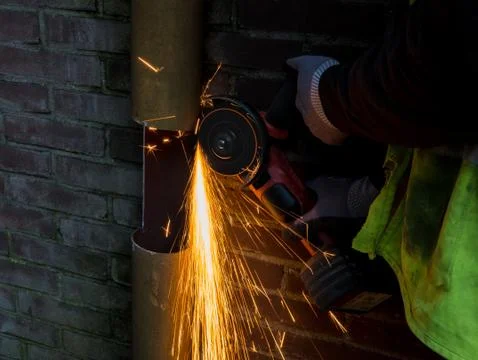 Sparks flying from an angle grinder Stock Photos