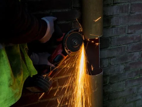 Sparks flying from an angle grinder Stock Photos