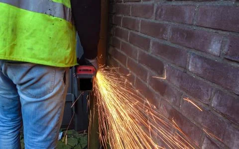 Sparks flying from an angle grinder Stock Photos