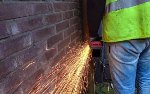 Sparks flying from an angle grinder Stock Photos