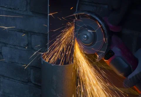 Sparks flying from an angle grinder Stock Photos