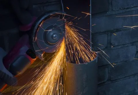 Sparks flying from an angle grinder Stock Photos