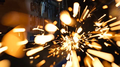 Sparks flying in to the camera from grinder machine. Stock Footage 124169427