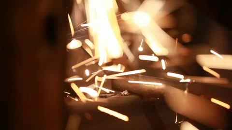 Sparks flying towards camera Stock Footage 12019583