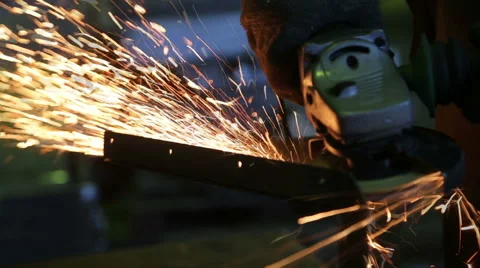 Sparks from the grinder at a metal processing Stock Footage 68372960