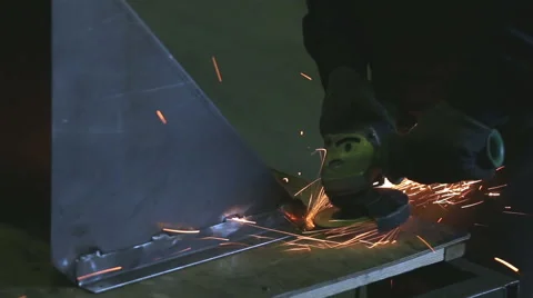 Sparks from the grinder at a metal processing Stock Footage 68373049