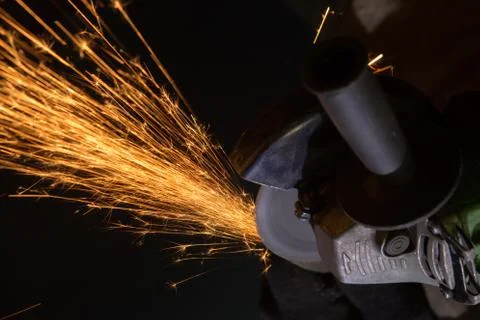 Sparks from the grinder Stock Photos