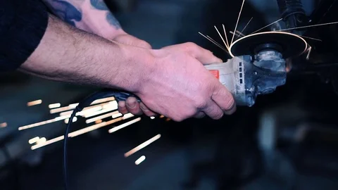 Sparks from the grinding grinder frame custom motorbike Stock-Footage 71329036