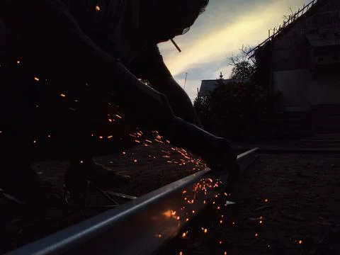 Sparks from the grinding machine 스톡 사진