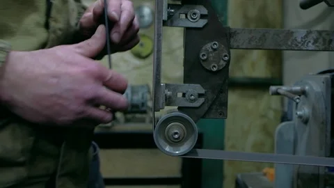 Sparks grinding wheel while knife sharpening. Stock Footage 169939824
