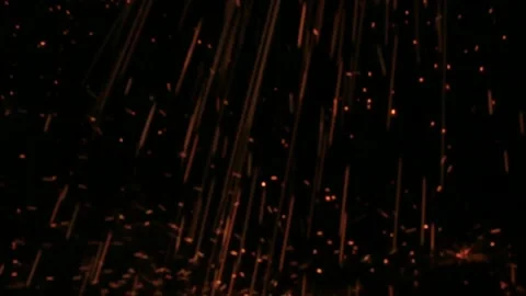 Sparks hitting the ground. soft focus Stock Footage 132472370
