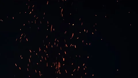 Sparks from a large fire fly up into the sky Stock Footage 157844673