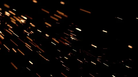 Sparks showering on black background Stock Footage 121619191