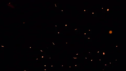 Sparks Take Off and Go Out in the Dark HD Pro Stock Footage 115847341