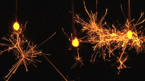 Sparks of Three Sparklers Stock Footage 332056990