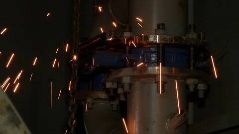 Sparks from welding fall down. Stock Footage 115018954