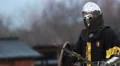 Sparring partners fighting with swords at training field, knights in a battle HD Footage