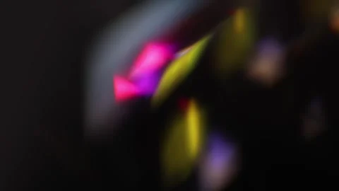 Sparse chaotic prism bokeh and glowing light spots on a black background fo.. 스톡 동영상 341736883