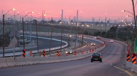 Sparse vehicle traffic on the road under construction Stock Footage 37601090