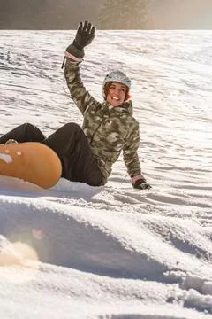  Spaß an einem sonnigen Wintertag Have fun snowboarding has a red-haired w.. Stock Photos