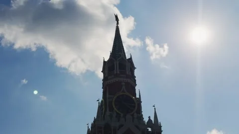 Spasskaya tower clock in moscow kremlin against sunny sky Video stock 343926013