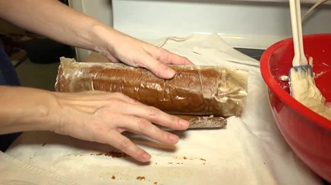 Speading Frosting On Pumpking Roll Stock-Footage 57653317