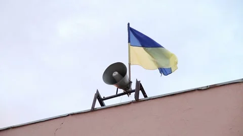 Speaker on the background of the flag of Ukraine Stock Footage 44342128