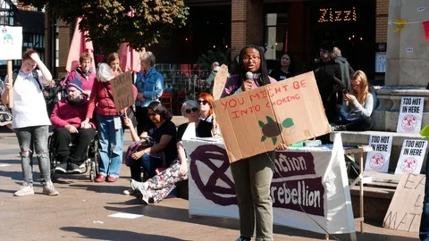 Speaker at climate change protest in Coventry city England Stock Footage 116347466