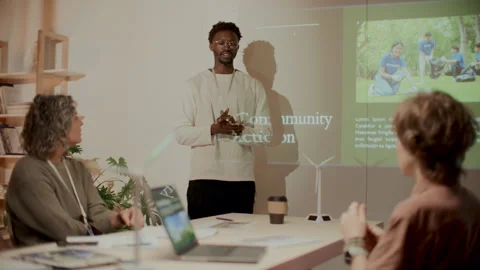 Speaker Concluding Presentation on Environmental Issues at Team Meeting Stock Footage 300229097