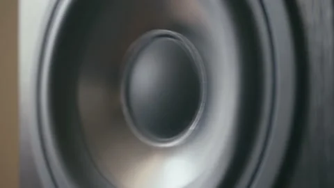 Speaker cone in out pumping from bass sound. Side view, loopable, static Stock Footage 161452076