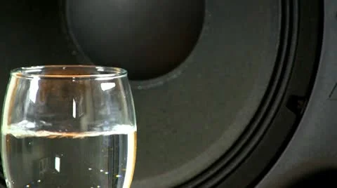 Speaker effects on wine glass; 2 Stock Footage 10599516