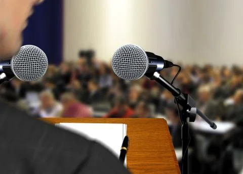 Speaker giving a speech during presentation Stock Photos