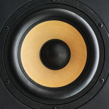 Speaker loudspeaker with yellow diffuser Stock Photos