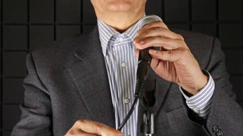 Speaker Plugs in the Microphone Vídeos de archivo 242382502