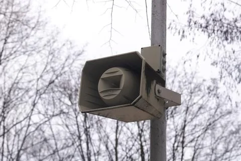 Speaker on a pole in the park Stock Photos