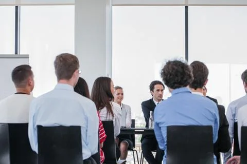 Speaker at presentation to audience Stock Photos
