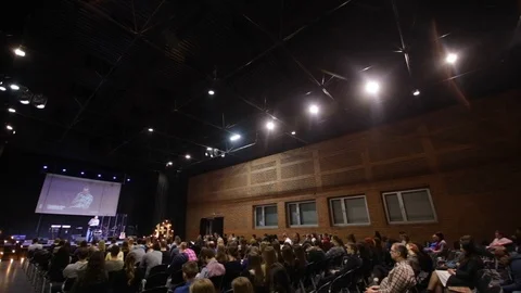 Speaker on stage. View from the audience. 스톡 동영상 96310926