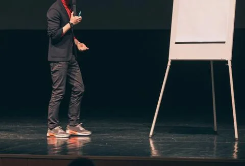 Speaker , standing in front of a flipchart during business presentation Stock Photos