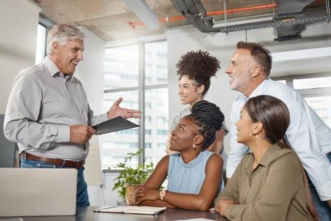 Speaker, talking and businessman with document in meeting, team and planning for Stock Photos