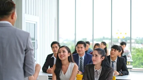 Speaker talking in seminar with many of audiences for business meeting for key o Stock Footage 97421999