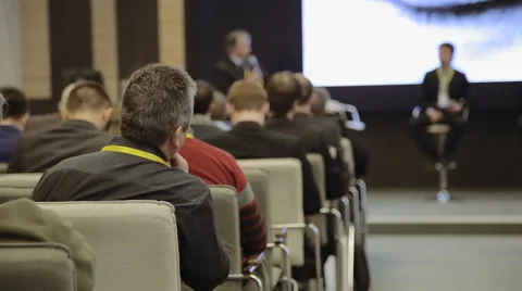 The speaker tells the interesting speech at large business conference Video stock 62855311