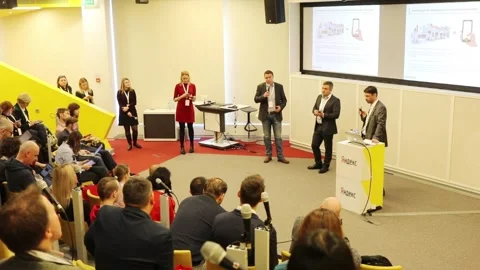 Speakers at conference dedicated to new application  refueling in  company Stock Footage 276362017
