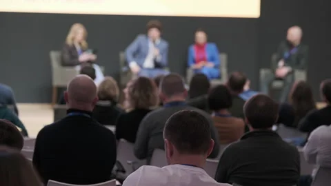Speakers discussing business problems in auditorium Stock Footage 152871663