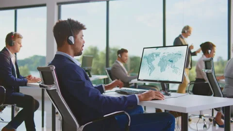 Speaking with customers via headset Video stock 164663644